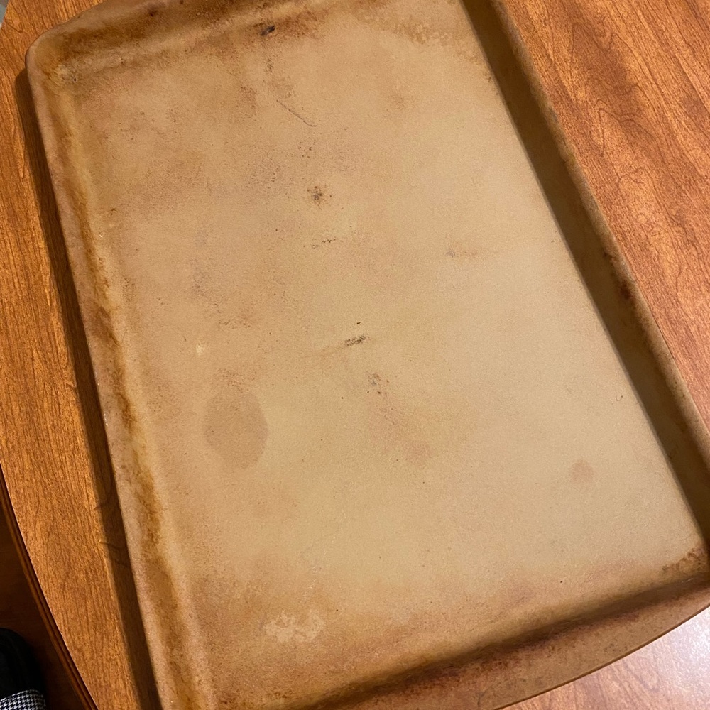 17x11 pampered chef, baking pan used but not enough to get seasoned in.